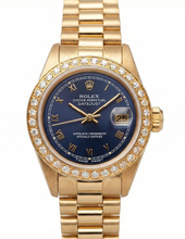 Afbeelding in Gallery-weergave laden, Geelgouden Rolex-dameshorloge in presidentiële stijl met datum, gewoon blauwe Romeinse wijzerplaat