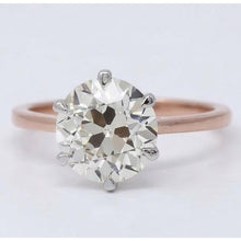 Afbeelding in Gallery-weergave laden, Solitaire Ring 14 Karaat Tweekleurig Goud met Diamant – vooraanzicht