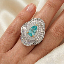 Afbeelding in Gallery-weergave laden, Neon Paraiba Halo Verlovingsring – VVS Zuiverheid 7,5 karaat