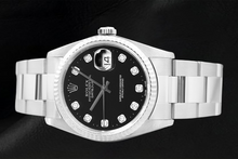 Afbeelding in Gallery-weergave laden, Rolex Datejust horloge met zwarte wijzerplaat en diamanten, en roestvrijstalen Oyster-armband.