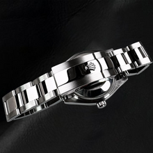 Afbeelding in Gallery-weergave laden, Rolex Datumjust 31 mm stalen dameshorloge met witte Romeinse wijzerplaat