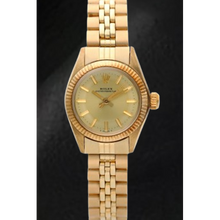 Afbeelding in Gallery-weergave laden, Rolex Oyster Perpetual geelgouden horloge met champagnekleurige wijzerplaat van 24 mm