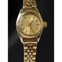 Afbeelding in Gallery-weergave laden, Rolex Oyster Perpetual geelgouden horloge met champagnekleurige wijzerplaat van 24 mm