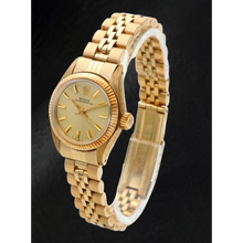 Afbeelding in Gallery-weergave laden, Rolex Oyster Perpetual geelgouden horloge met champagnekleurige wijzerplaat van 24 mm