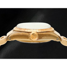 Afbeelding in Gallery-weergave laden, Rolex Oyster Perpetual geelgouden horloge met champagnekleurige wijzerplaat van 24 mm