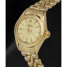 Afbeelding in Gallery-weergave laden, Rolex geelgouden horloge met champagnekleurige wijzerplaat van 24 mm