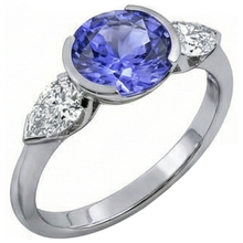 Afbeelding in Gallery-weergave laden, echte oval tanzaniet 2karaat ring close-up detail