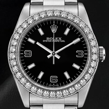 Afbeelding in Gallery-weergave laden, Rolex Oyster Perpetual 26mm 76030 Horloge met Zwarte Arabische Wijzerplaat en Diamanten Lunette