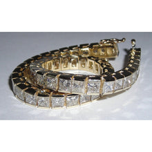 Afbeelding in Gallery-weergave laden, 12,50 karaat prinses diamanten tennisarmband geel goud - harrychadent.nl
