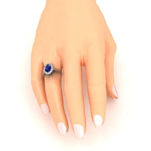 Afbeelding in Gallery-weergave laden, 3,5 ct ovale Ceylon saffier ronde diamanten ring wit goud 14k - harrychadent.nl