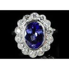 Afbeelding in Gallery-weergave laden, 5,15 ct ovale bezel set tanzaniet met diamanten ring 14 kt witgoud - harrychadent.nl