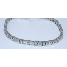 Afbeelding in Gallery-weergave laden, 7-karaats diamanten tennisarmband stokbrood en rond 14K witgoud - harrychadent.nl