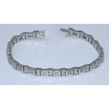 Afbeelding in Gallery-weergave laden, 7-karaats diamanten tennisarmband stokbrood en rond 14K witgoud - harrychadent.nl