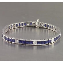 Afbeelding in Gallery-weergave laden, Blauwe saffier tennisarmband prinses geslepen 25 karaat witgoud 14K - harrychadent.nl