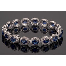 Afbeelding in Gallery-weergave laden, Blue Sapphire Tennisarmband Prong Set 39 karaat damessieraden - harrychadent.nl