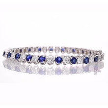 Afbeelding in Gallery-weergave laden, Tennisarmband met blauwe saffier en diamanten 8,40 karaat witgoud 14K - harrychadent.nl