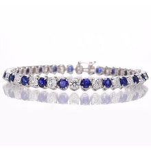 Afbeelding in Gallery-weergave laden, Tennisarmband met blauwe saffier en diamanten 8,40 karaat witgoud 14K - harrychadent.nl