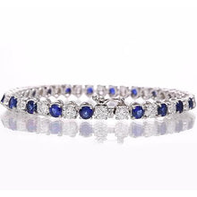 Afbeelding in Gallery-weergave laden, Tennisarmband met blauwe saffier en diamanten 8,40 karaat witgoud 14K - harrychadent.nl