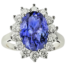 Afbeelding in Gallery-weergave laden, Ring met 19.75 Ct Ovale Tanzaniet en Natuurlijke uit de aarde gewonnen Diamanten in Bloemstijl 14K Goud
