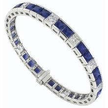 Afbeelding in Gallery-weergave laden, IGI GECERTIFICEERDE Blauwe Saffier Tennisarmband Prinsesslijpsel 25 Karaat Witgoud 14K
