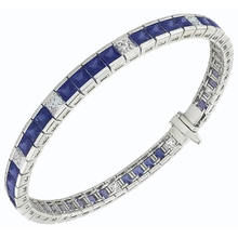 Afbeelding in Gallery-weergave laden, IGI GECERTIFICEERDE Blauwe Saffier Tennisarmband Prinsesslijpsel 25 Karaat Witgoud 14K
