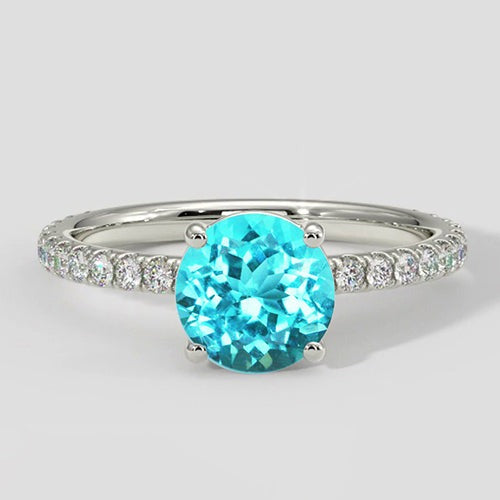 Blauwe Paraiba ring met ronde diamantaccenten