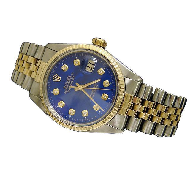 Blauwe diamanten wijzerplaat met gecanneleerde lunette Rolex Datumjust tweekleurig roestvrij staal en goud snel ingesteld
