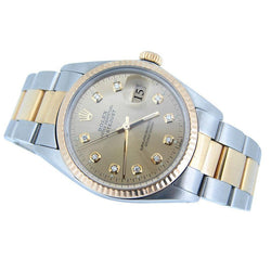 Diamanten wijzerplaat Rolex Datumjust horloge roestvrij staal & gouden armband gecanneleerde lunette