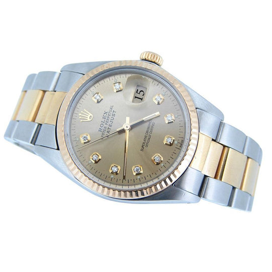 Diamanten wijzerplaat Rolex Datumjust horloge roestvrij staal & gouden armband gecanneleerde lunette
