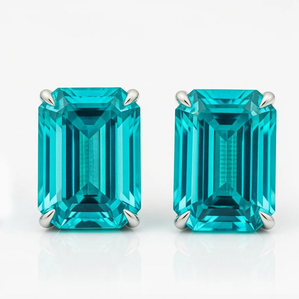Emerald Paraiba oorbellen in witgoud