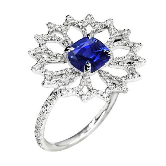Kussen in bloemstijl en ronde diamanten ring met blauwe saffier 2.51 ct. - harrychadent.nl