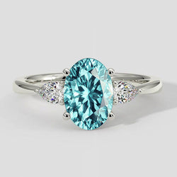 Ovale Paraiba-ring met drie stenen