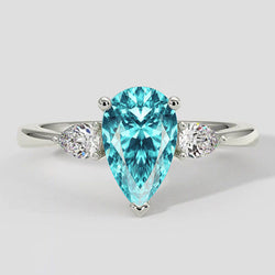 Peervormige Paraiba Zijsteen Ring