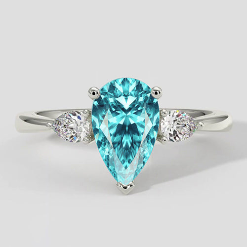 Peervormige Paraiba Zijsteen Ring
