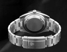 Afbeelding in Gallery-weergave laden, Rolex Datumjust 31mm roestvrijstalen dameshorloge met roze index
