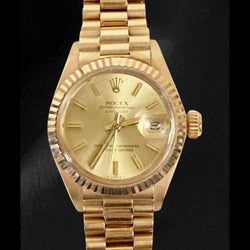 Rolex Datejust presidentiële stijl 26 mm champagne wijzerplaat geelgoud dameshorloge