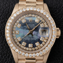 Afbeelding in Gallery-weergave laden, Rolex Datumjust dameshorloge parelmoer diamanten wijzerplaat geel goud
