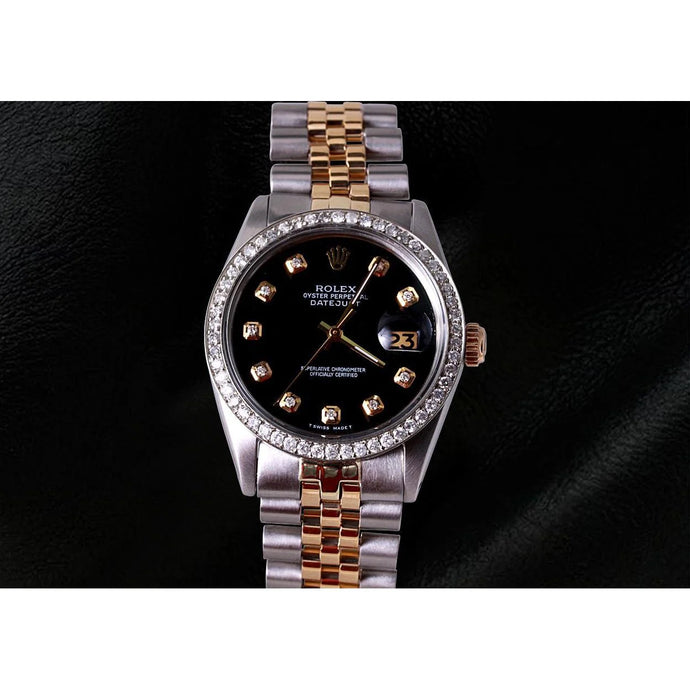 Rolex Datumjust horloge tweekleurige jubileumarmband zwarte diamanten wijzerplaat Rolex