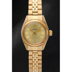 Rolex Oyster Perpetual geelgouden horloge met champagnekleurige wijzerplaat van 24 mm