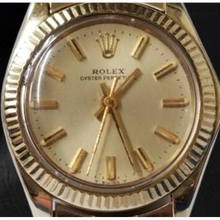 Afbeelding in Gallery-weergave laden, Rolex Oyster Perpetual geelgouden horloge met champagnekleurige wijzerplaat van 24 mm
