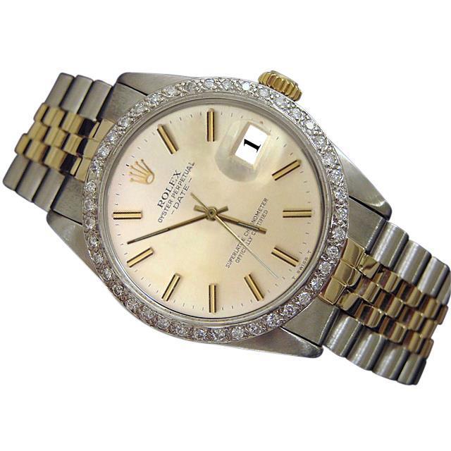 Rolex datumhorloge zilveren stok wijzerplaat diamanten rand roestvrij staal en goud jubileum
