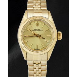 Rolex geelgouden horloge met champagnekleurige wijzerplaat van 24 mm
