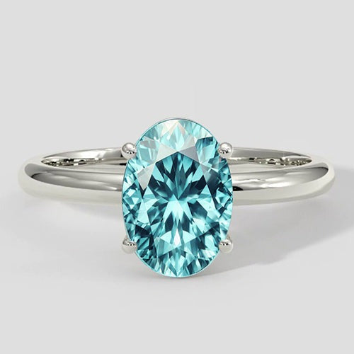 Solitaire ovale blauwachtige Paraiba-ring 3 karaat