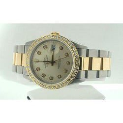 Tweekleurige datumjust-horloge met diamanten wijzerplaat en rand