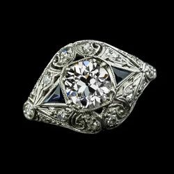 Antieke Ring met uit de aarde gewonnen Diamant met Edwardiaanse slijpvorm en Trillion Saffier