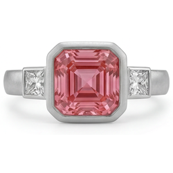 Verlovingsring met perziksaffier 2,9 karaat natuurlijke Asscher Padparadscha en witte baguette lunette drie stenen 14K goud