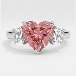 Padparadscha saffier ring 3,6 karaat natuurlijke hartvorm en witte baguette driesteens platina