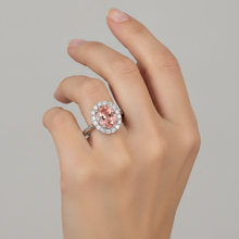 Afbeelding in Gallery-weergave laden, Padparadscha saffier ring 4,3 karaat labgekweekt ovaal Halo 14K witgoud
