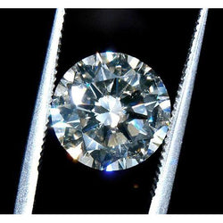 Rondgeslepen, losse, natuurlijke diamant van 0,75 karaat, nieuw en onbeschadigd.