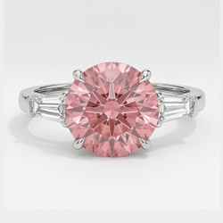 Drie-steens platina ring met echte ronde padparadschasaffier van 3,1 karaat en witte baguettes